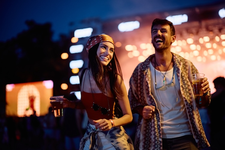 couple dancing at festival / convert together